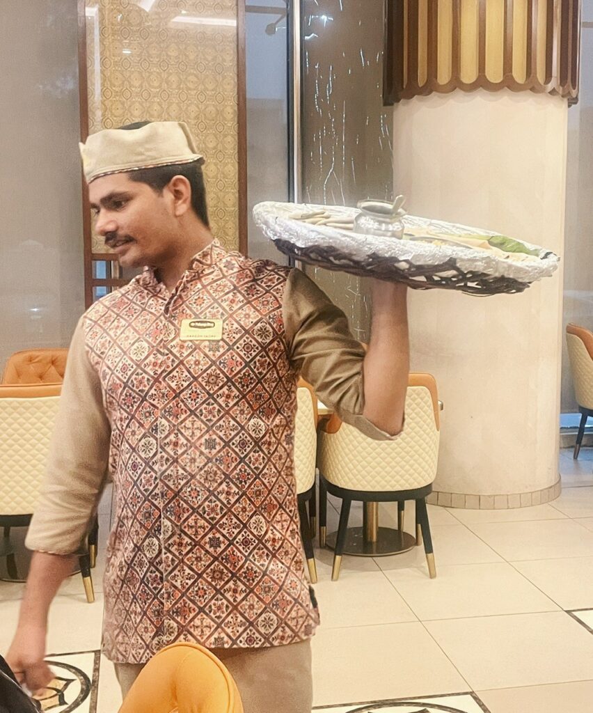 waiter at Maharaja bhog dubai