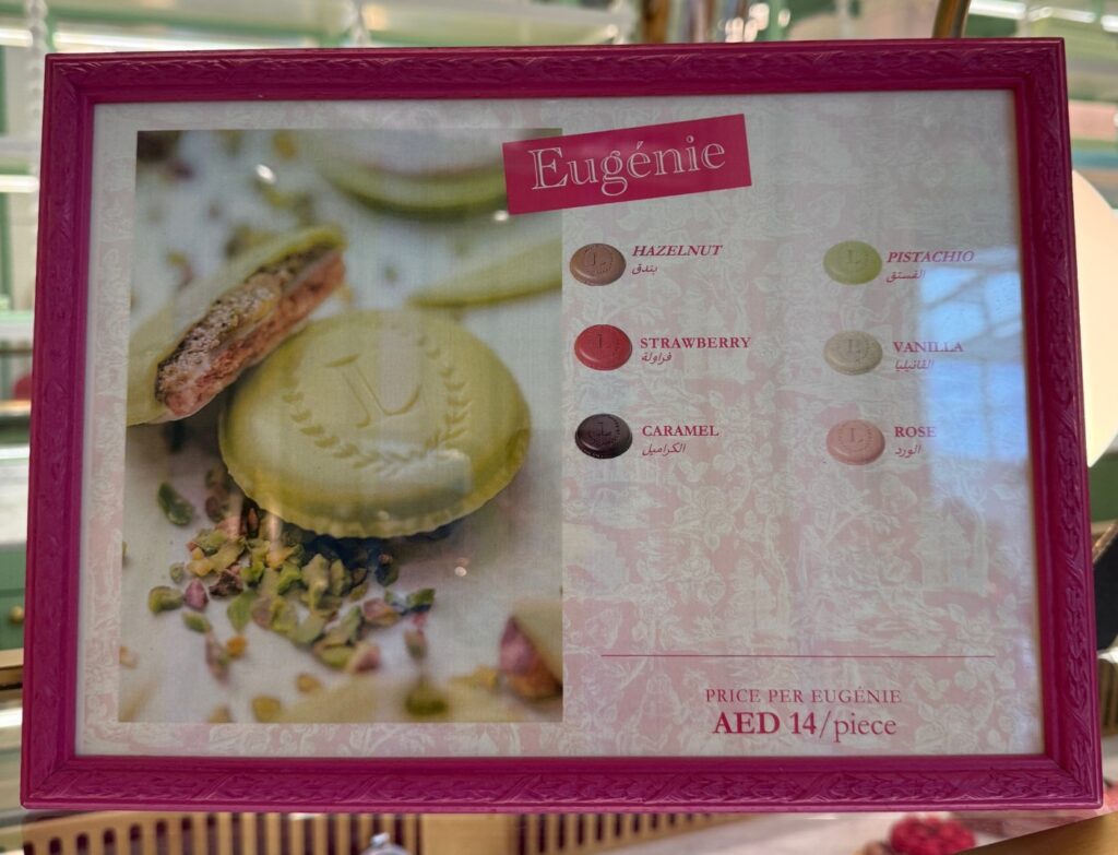 Eugénie flavour menu at Ladurée Dubai Hills Mall listing available flavours like vanilla and rose.