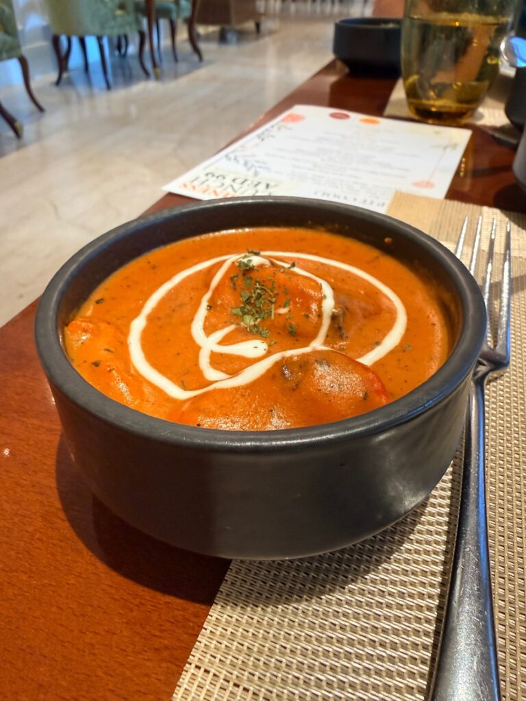 Creamy butter chicken curry at Punjab Grill Dubai with rich spiced sauce