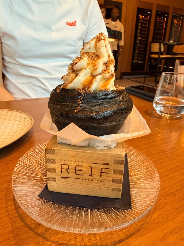 Croissant dessert at Reif Dubai filled with vanilla soft serve ice cream.
